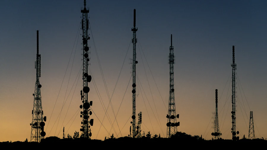 Telecommunications tower at sunset representing Acorn Technology connectivity services