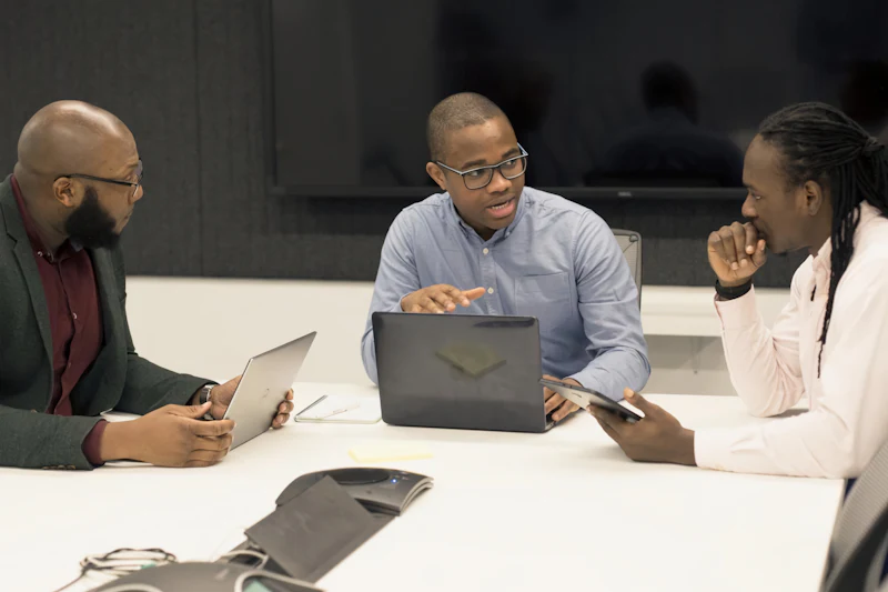 Acorn Technology team collaborating around a table